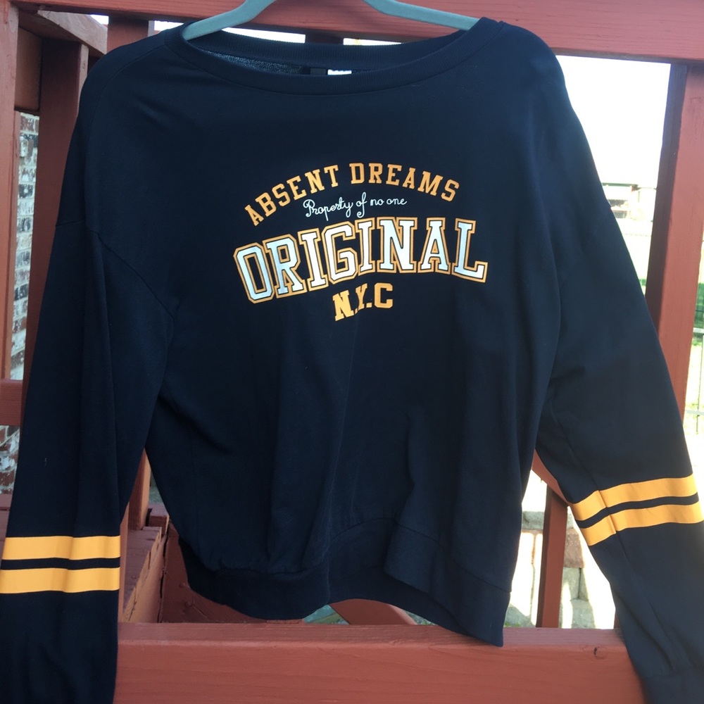 A navy H&M sweatshirt